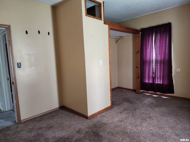 403 S Elm St, Lincoln, IL 62656 - spare room with carpet and baseboards