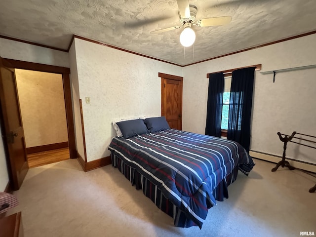 323 E Cortland St, Avon, IL 61415 - bedroom featuring a ceiling fan, carpet floors, crown molding, baseboards, and a textured ceiling