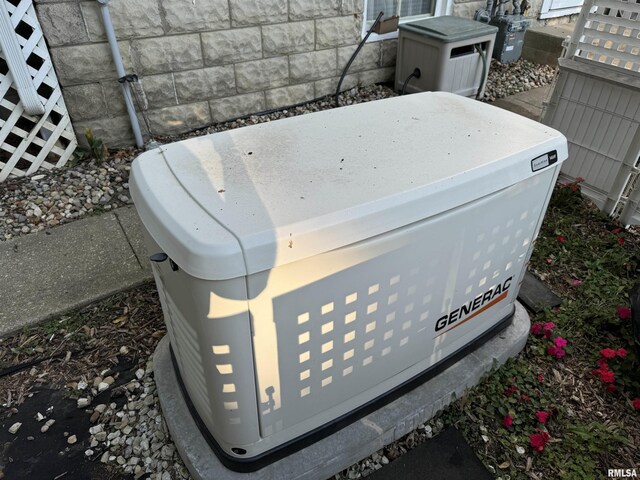 323 E Cortland St, Avon, IL 61415 - exterior details featuring gas meter and a power unit