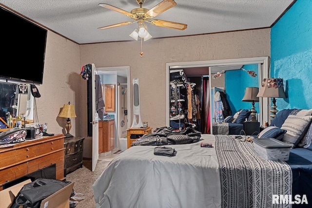 bedroom with ornamental molding, a ceiling fan, a textured wall, and a textured ceiling