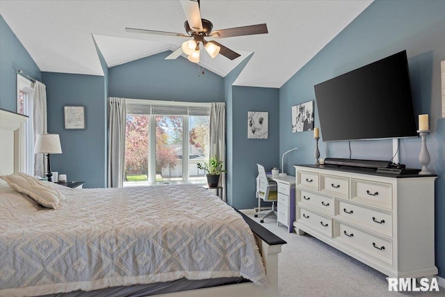 bedroom with light colored carpet, vaulted ceiling, a ceiling fan, and access to exterior
