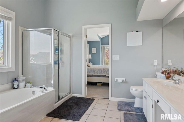 full bath with a shower stall, tile patterned floors, vanity, a bath, and baseboards
