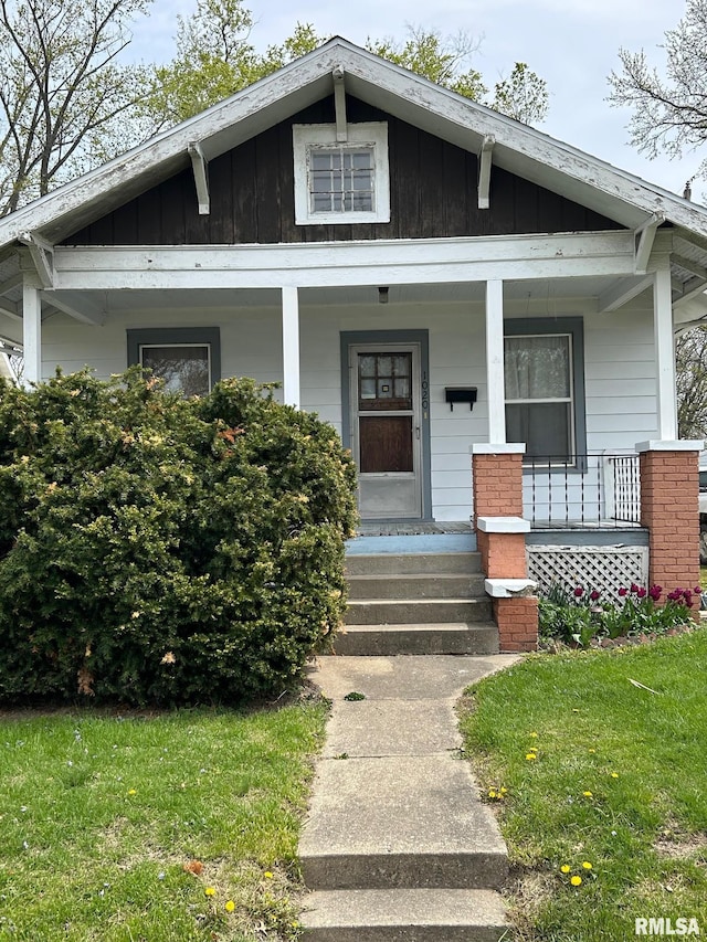 view of front of home with board and batten siding and covered porch