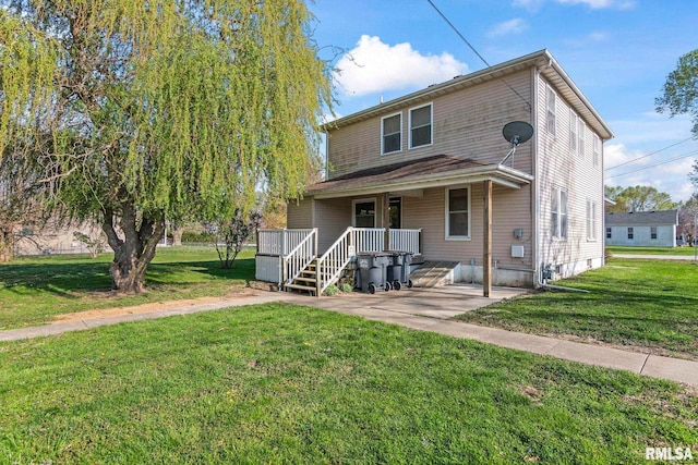 101 E Lester St, Williamsville, IL 62693 - back of house with a lawn
