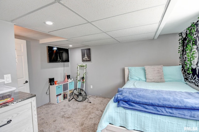 carpeted bedroom with recessed lighting