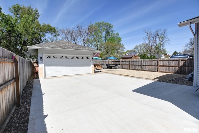 detached garage with fence
