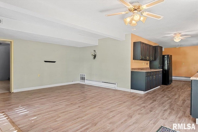 unfurnished living room with a baseboard radiator, ceiling fan, baseboards, and light wood-style floors