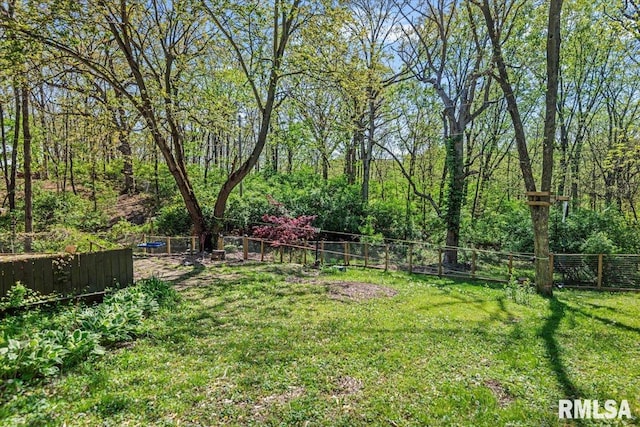 view of yard featuring fence
