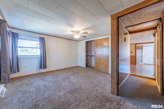 1620 N 703rd Ln, Liberty, IL 62347 - unfurnished bedroom featuring a ceiling fan, baseboards, carpet, and a closet
