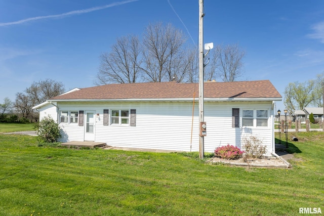 1620 N 703rd Ln, Liberty, IL 62347 - exterior space featuring a front lawn and roof with shingles