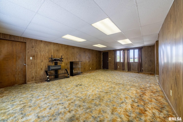 1620 N 703rd Ln, Liberty, IL 62347 - spare room with wood walls, carpet flooring, and a paneled ceiling