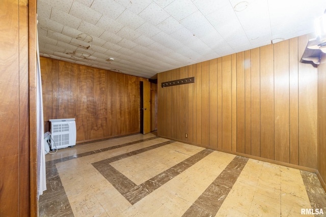 1620 N 703rd Ln, Liberty, IL 62347 - spare room featuring wooden walls and tile patterned floors