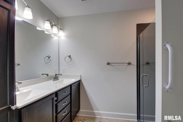 515 Gardendale Dr, Quincy, IL 62301 - bathroom with a sink, double vanity, and a stall shower