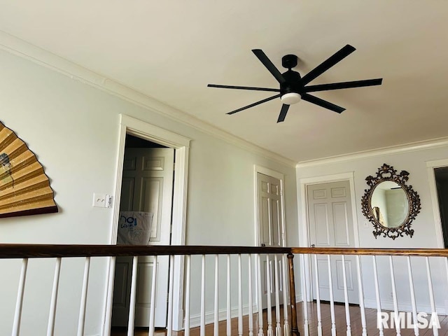 hallway featuring crown molding