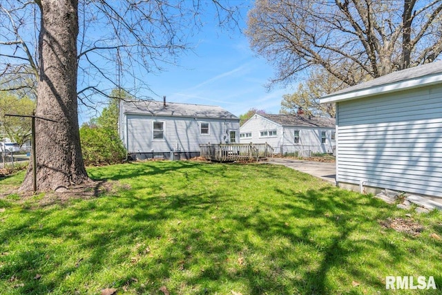 view of yard featuring a wooden deck