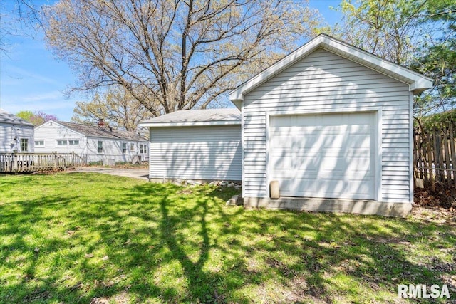 garage with fence