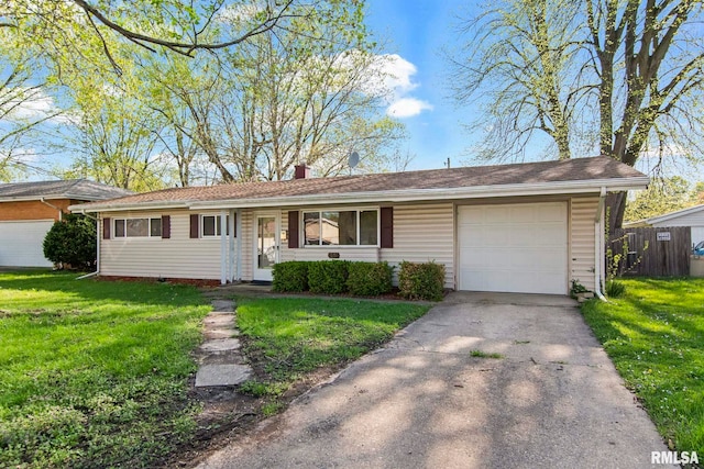 ranch-style house with a garage, a chimney, a front lawn, and concrete driveway