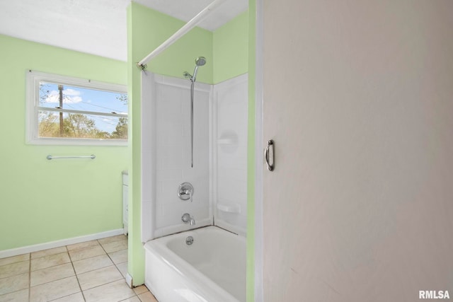 full bathroom with tile patterned floors, baseboards, and shower / washtub combination