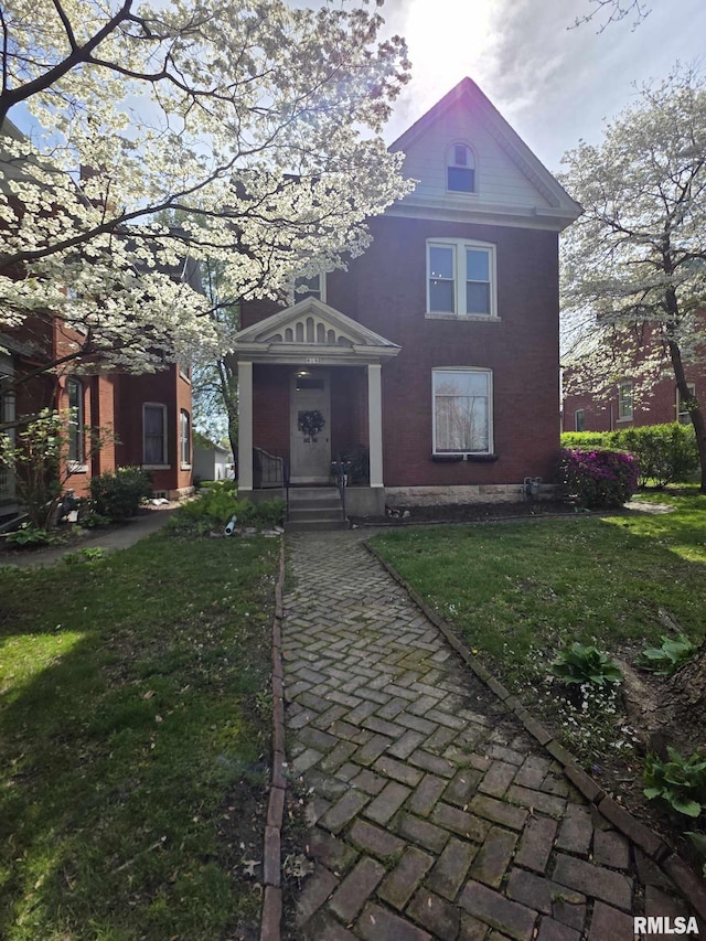 419 S 16th St, Quincy, IL 62301 - victorian home with a front lawn