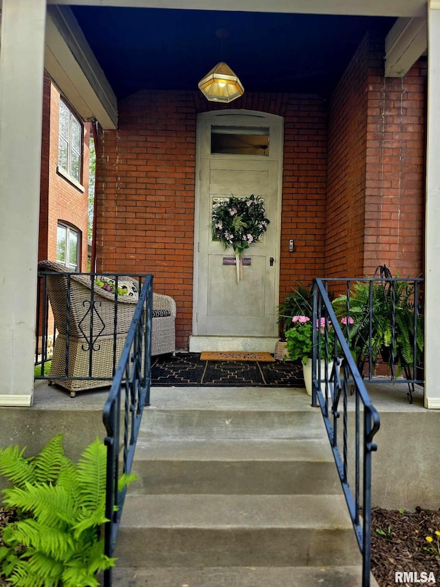 419 S 16th St, Quincy, IL 62301 - entrance to property featuring a porch and brick siding
