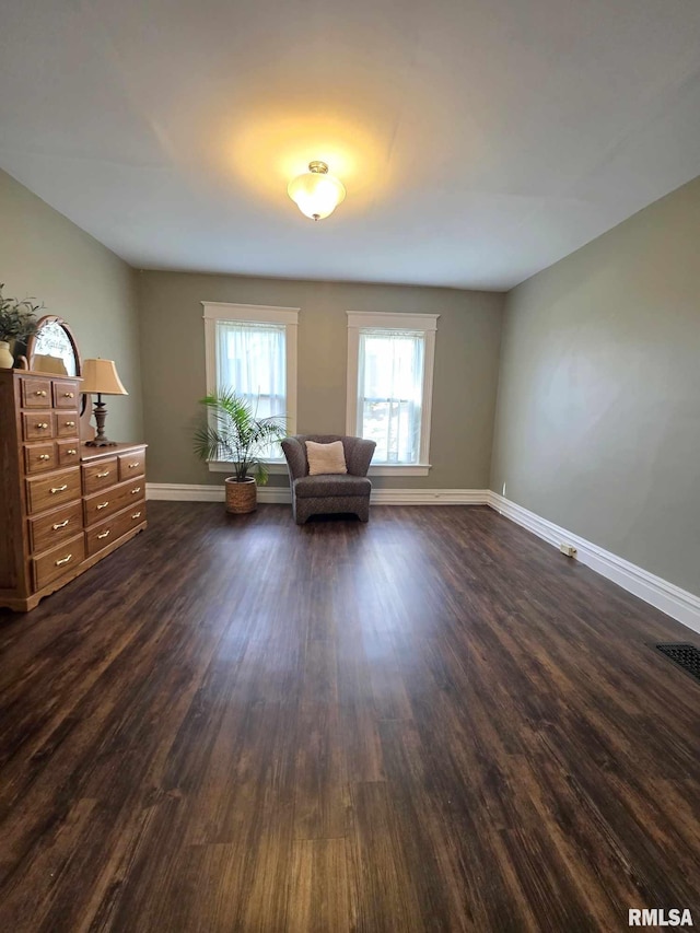 419 S 16th St, Quincy, IL 62301 - sitting room with baseboards and dark wood-style flooring