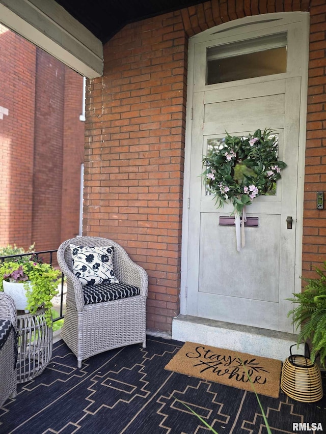 419 S 16th St, Quincy, IL 62301 - property entrance with brick siding and a porch