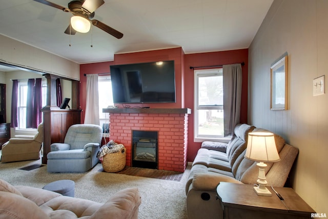 344 S State Rd, Mendon, IL 62351 - carpeted living room with a ceiling fan and a brick fireplace