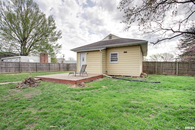 344 S State Rd, Mendon, IL 62351 - rear view of house with a fenced backyard, a deck, and a lawn
