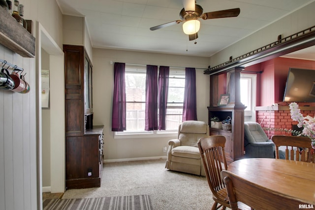 344 S State Rd, Mendon, IL 62351 - dining area featuring light colored carpet, ceiling fan, baseboards, and crown molding