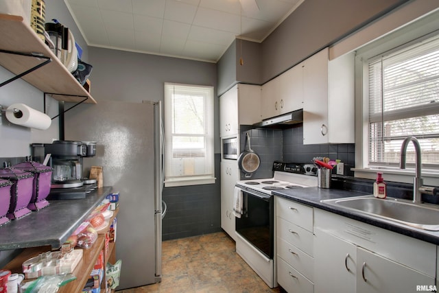 344 S State Rd, Mendon, IL 62351 - kitchen with a wealth of natural light, under cabinet range hood, a sink, and electric range