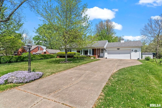 ranch-style house featuring concrete driveway, a chimney, a front yard, and a garage