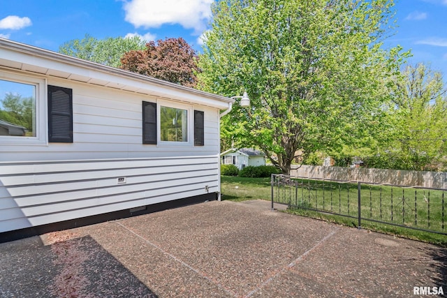 view of patio / terrace featuring fence