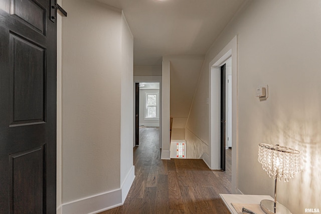 203 Oglesby Ave, Lincoln, IL 62656 - corridor with baseboards and dark wood-style floors