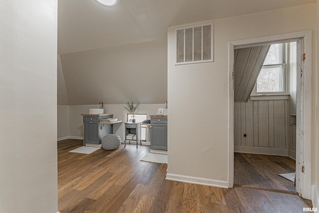 203 Oglesby Ave, Lincoln, IL 62656 - office with vaulted ceiling, baseboards, wood finished floors, and visible vents