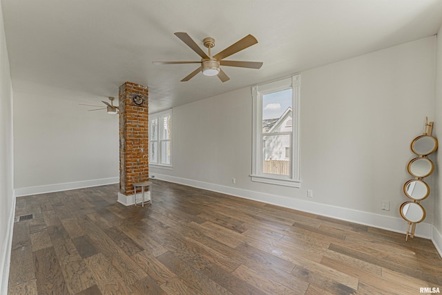 203 Oglesby Ave, Lincoln, IL 62656 - unfurnished living room with ceiling fan, baseboards, and wood finished floors