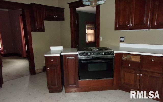212 Main St, Franklin, IL 62638 - kitchen featuring light countertops, light floors, and gas stove