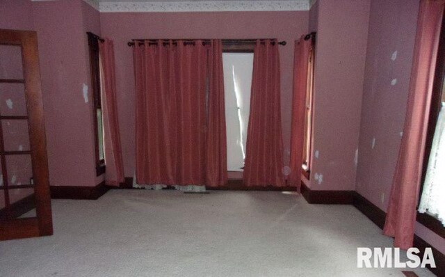 212 Main St, Franklin, IL 62638 - empty room featuring carpet flooring
