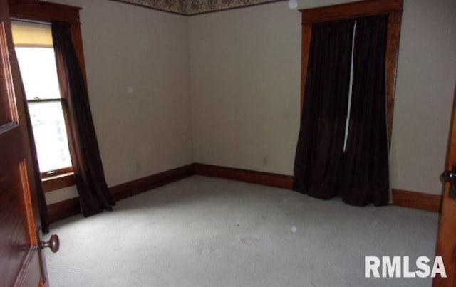212 Main St, Franklin, IL 62638 - unfurnished room featuring baseboards and light colored carpet
