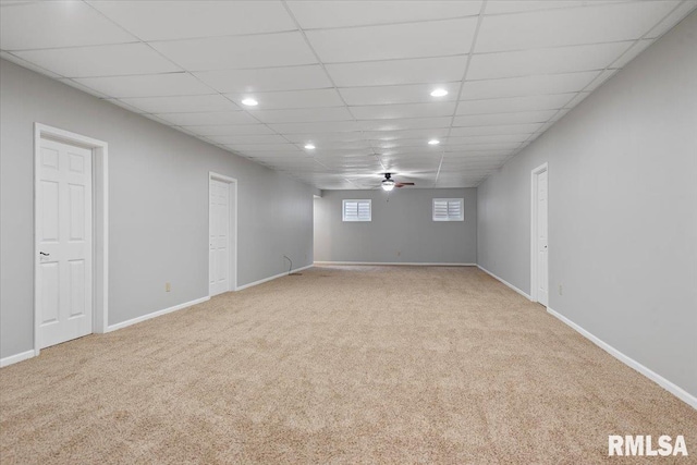 below grade area featuring recessed lighting, carpet flooring, a ceiling fan, and baseboards