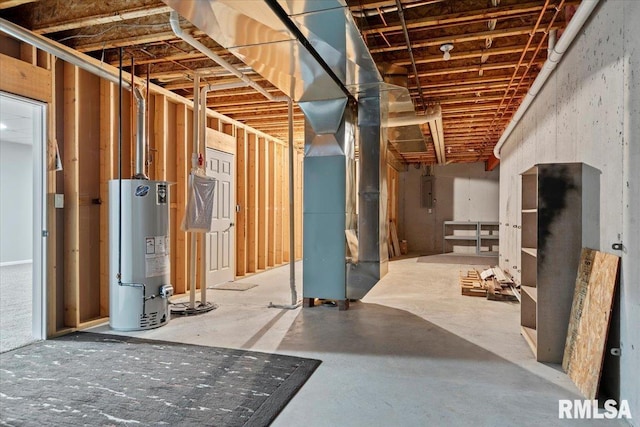 unfinished basement with gas water heater, heating unit, and electric panel