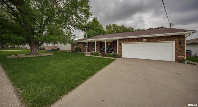 single story home with covered porch, an attached garage, central AC, concrete driveway, and a front lawn