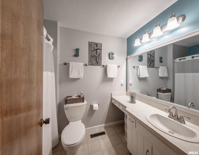 bathroom with toilet, a textured ceiling, visible vents, tile patterned flooring, and vanity