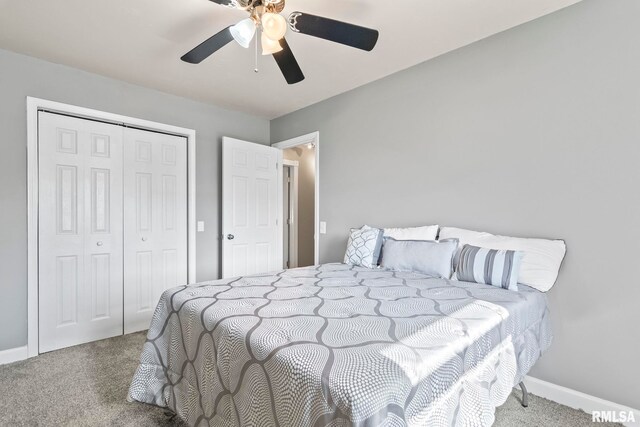 carpeted bedroom with baseboards, ceiling fan, and a closet