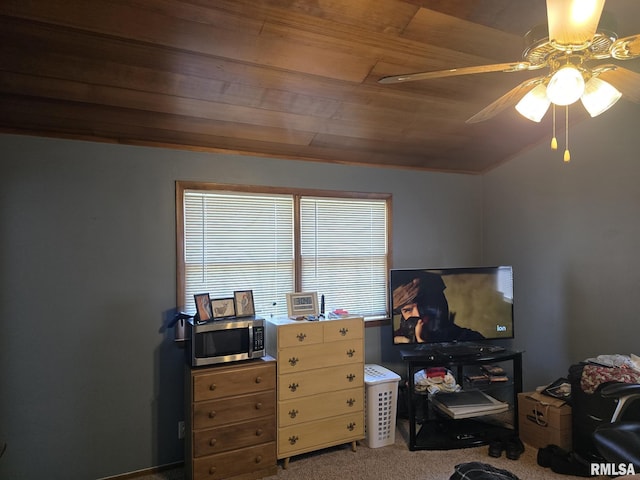 carpeted bedroom featuring a ceiling fan, lofted ceiling, and wood ceiling