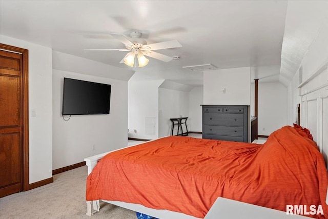 bedroom featuring baseboards, a ceiling fan, visible vents, and light carpet