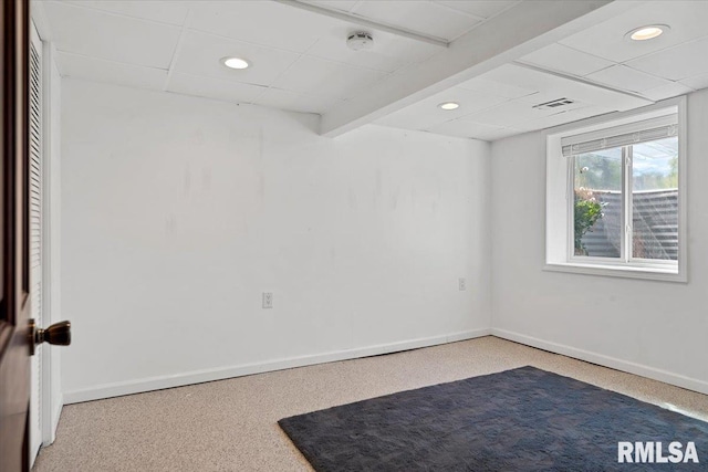spare room with baseboards, recessed lighting, and visible vents