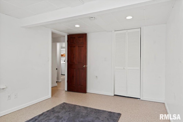unfurnished bedroom with baseboards, recessed lighting, and a closet