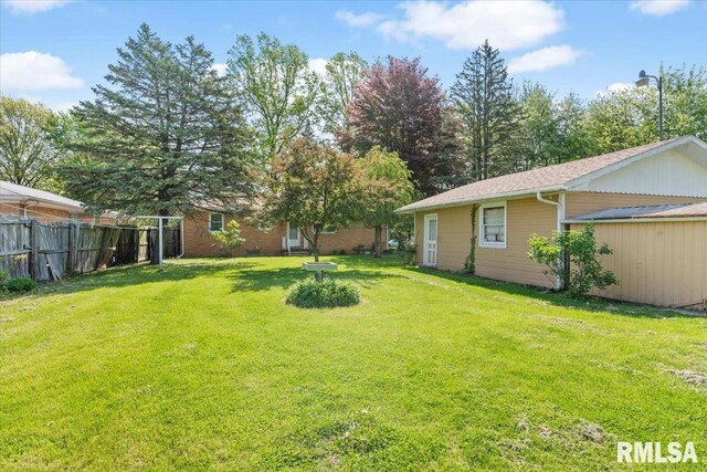view of yard with fence