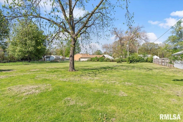 view of yard featuring fence