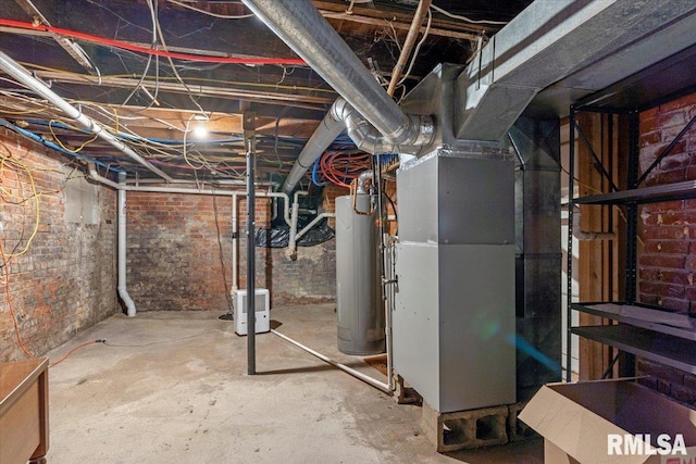 unfinished basement featuring gas water heater and heating unit